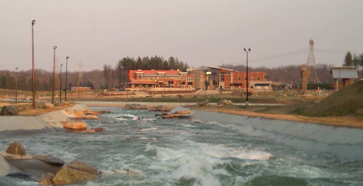 Artificial whitewater rafting course at a Charlotte outdoor adventure and kayaking recreation center.