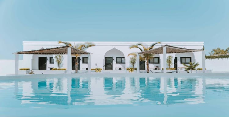 Luxury beach vacation villa with pool in a tropical setting, perfect for relaxation and exploring coastal destinations.