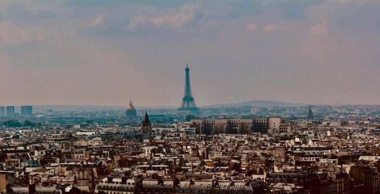 Paris cityscape with Eiffel Tower, travel, directions, Paris landmarks, city skyline, tourism, architecture, destinations, urban exploration, travel guide.