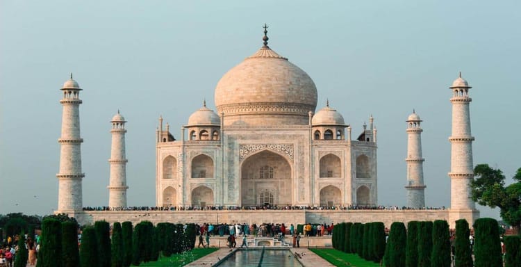 Iconic Taj Mahal monument in India, tourist attraction, UNESCO World Heritage site, famous architectural marvel, travel destination.