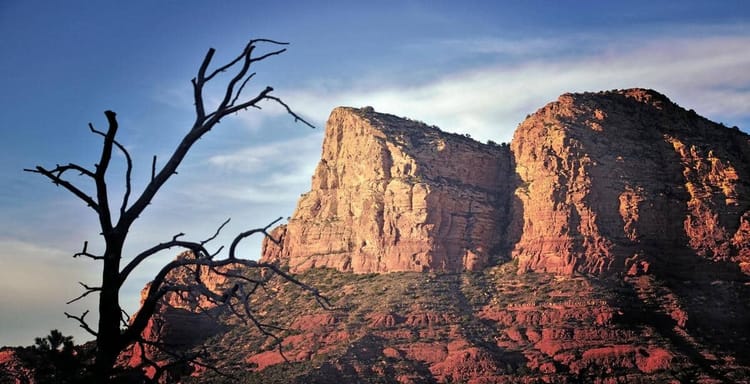 Breathtaking red rock formations in Sedona at sunset, perfect for outdoor adventures and scenic drives.