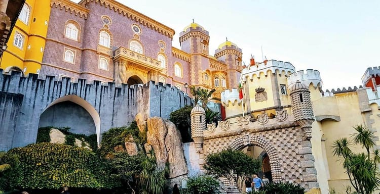 Colorful castle-themed architecture at QuestForDirections theme park.
