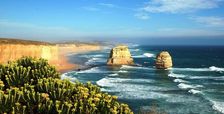 Vivid coastal cliffs and iconic rock formations at famous Twelve Apostles, Great Ocean Road, Australia.