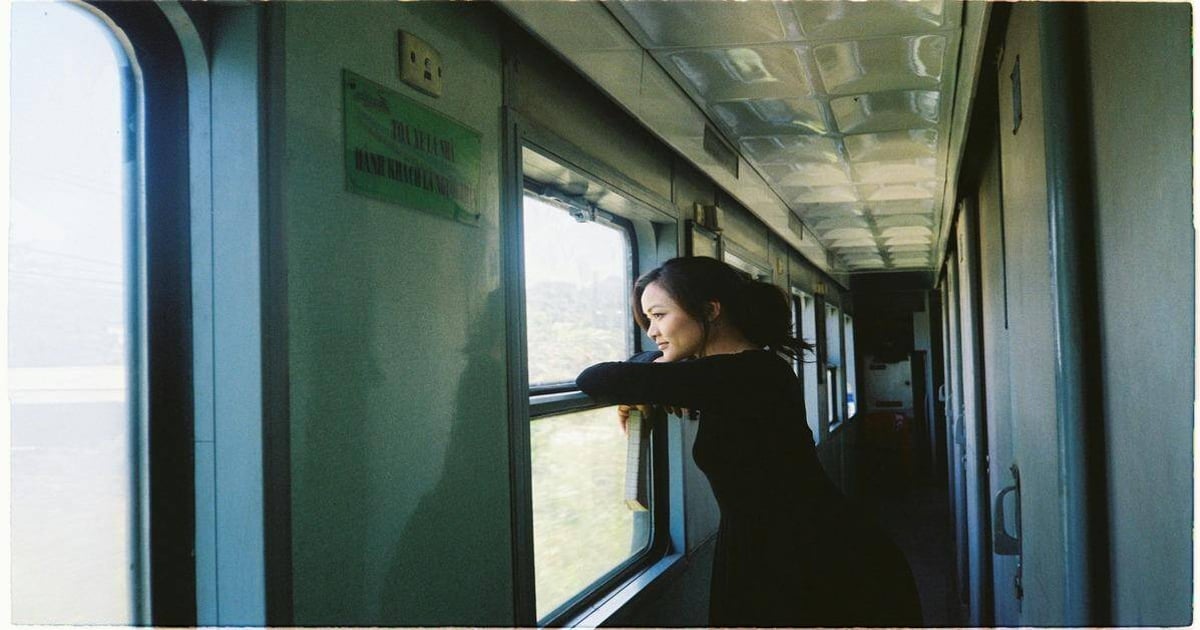 Young woman looking out train window, enjoying scenic landscape, travel, journey, adventure, transportation, exploration, mobility, scenic views, train travel.