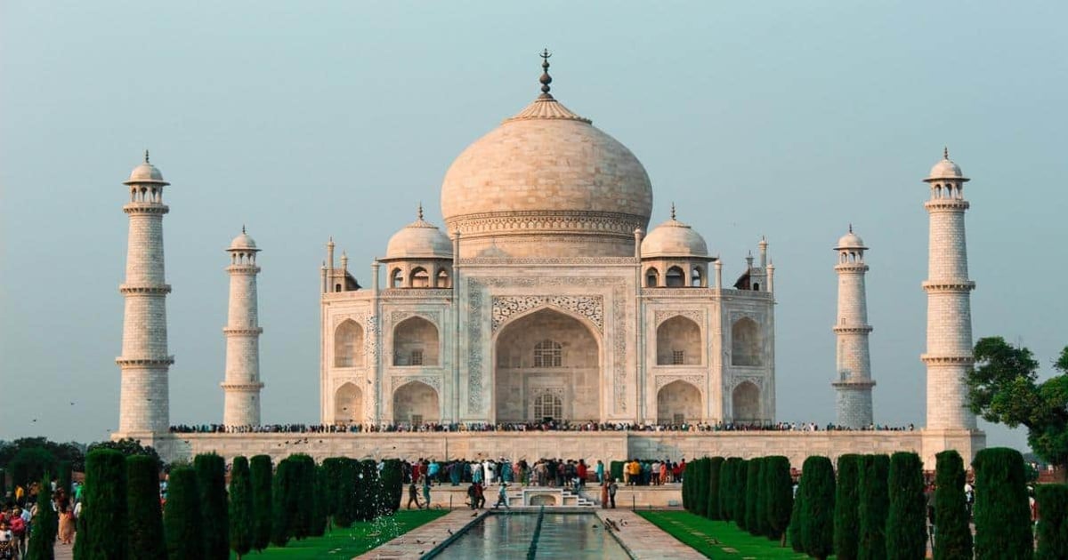Iconic Taj Mahal monument in India, tourist attraction, UNESCO World Heritage site, famous architectural marvel, travel destination.