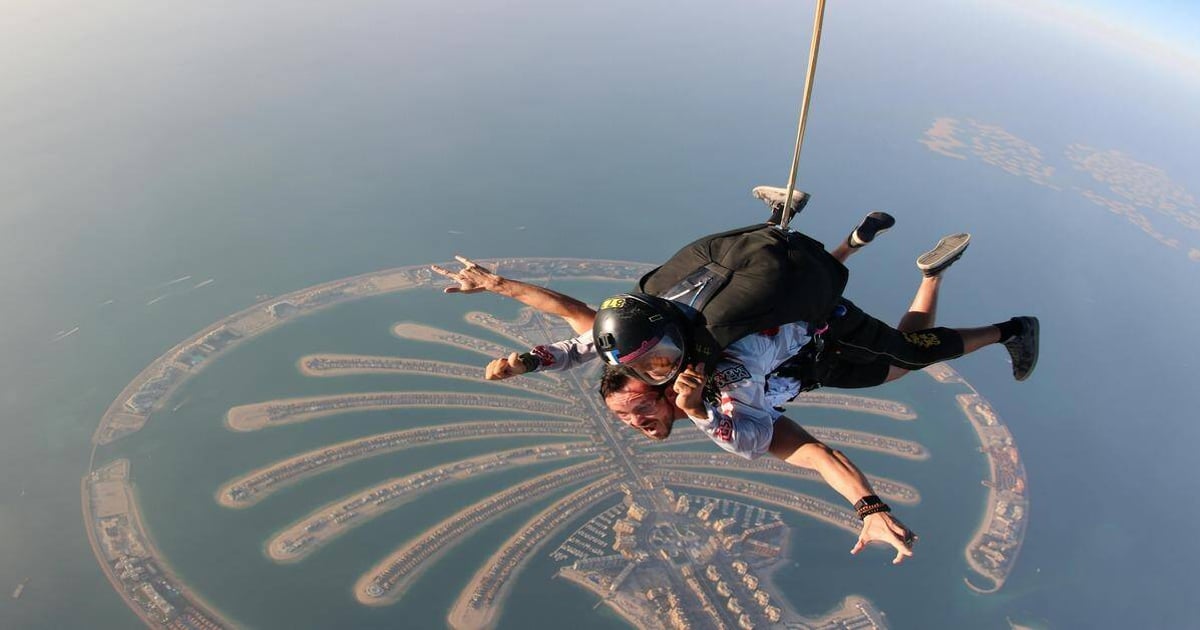 Adrenaline-filled tandem skydiving over Dubai Palm Jumeirah with stunning city views.