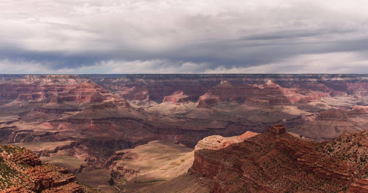 Vivid view of the Grand Canyon showcasing layered rock formations and dramatic landscape.