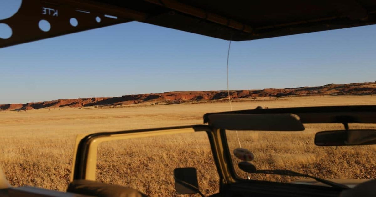 Stunning desert landscape viewed from a vehicle during a scenic road trip.
